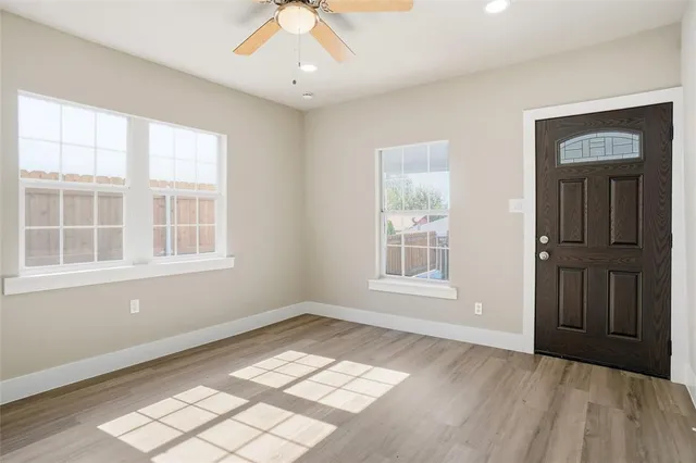 an empty room with windows