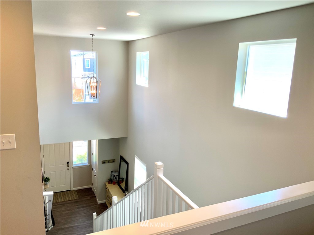 5107 Kenrick Street Southeast Lacey, WA 98503 - Photo 12 of 31 a view of entryway with wooden floor