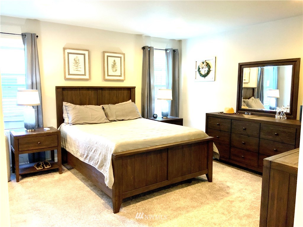 5107 Kenrick Street Southeast Lacey, WA 98503 - Photo 16 of 31 a bedroom with a bed and window