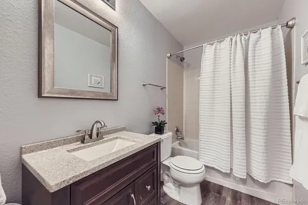a room with furniture and a window