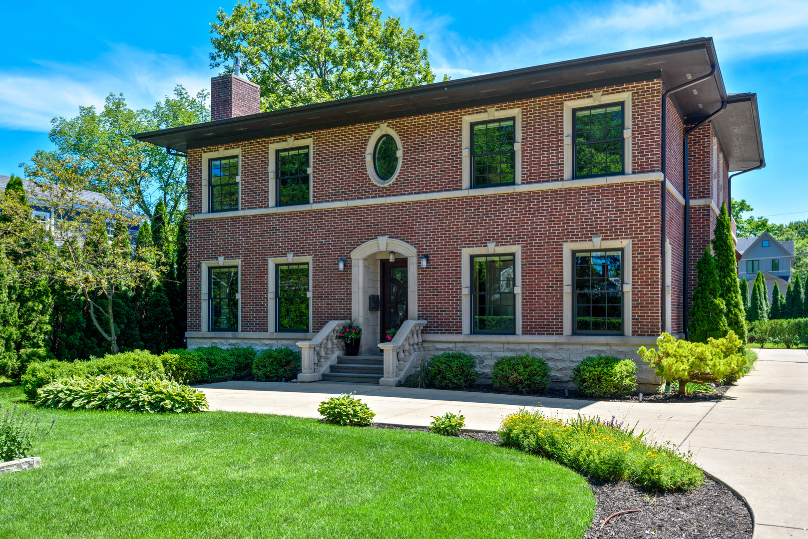 2015 Lake Avenue Wilmette, IL 60091 - Photo 2 of 45 a front view of a house with garden