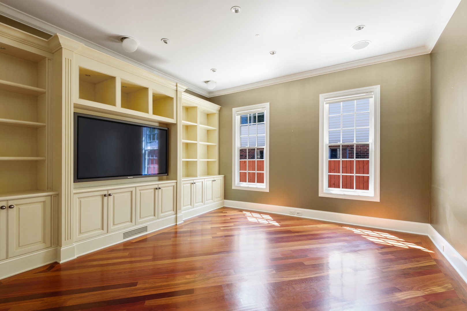 2015 Lake Avenue Wilmette, IL 60091 - Photo 14 of 45 a view of an empty room with wooden floor and windows