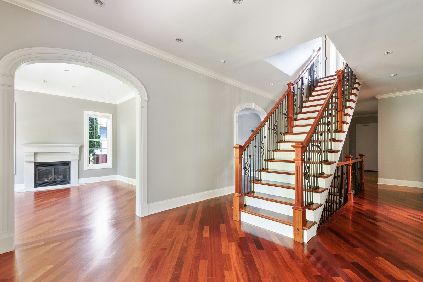 2015 Lake Avenue Wilmette, IL 60091 - Photo 3 of 45 a view of a livingroom with wooden floor staircase and a kitchen