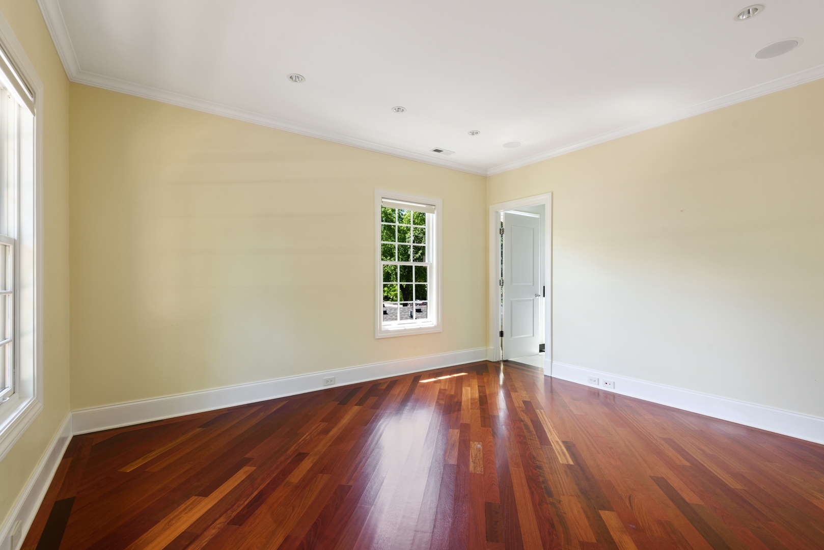 2015 Lake Avenue Wilmette, IL 60091 - Photo 21 of 45 an empty room with wooden floor and windows