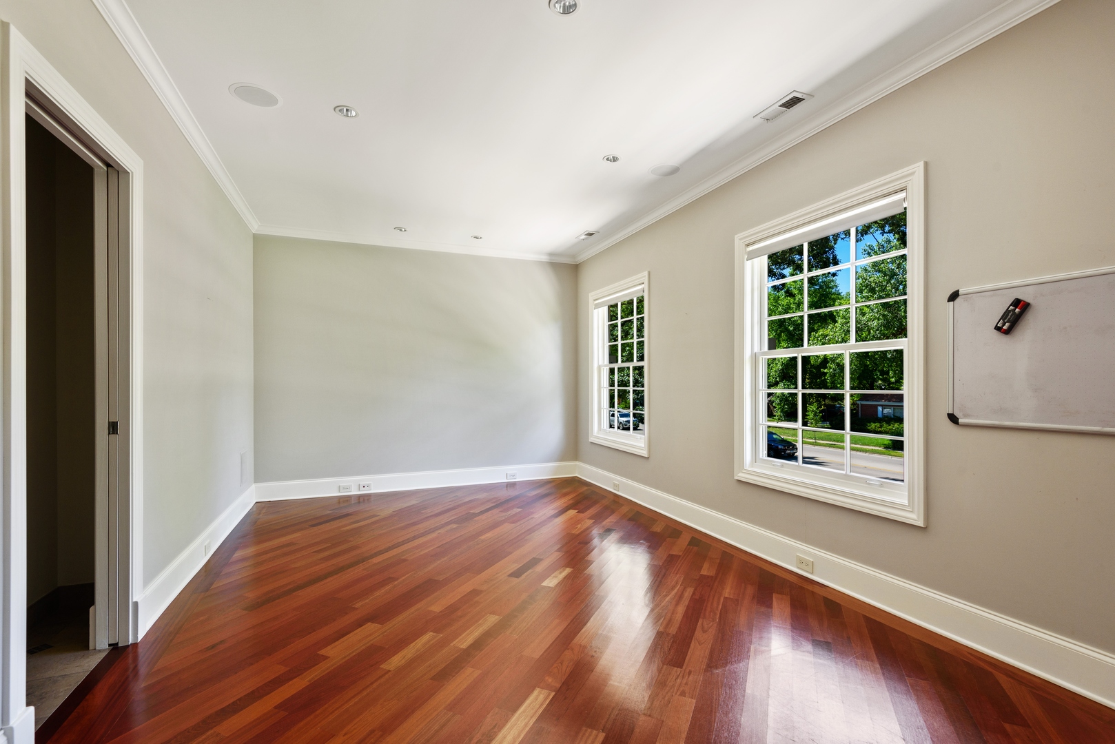 2015 Lake Avenue Wilmette, IL 60091 - Photo 23 of 45 a view of an empty room with wooden floor and a window