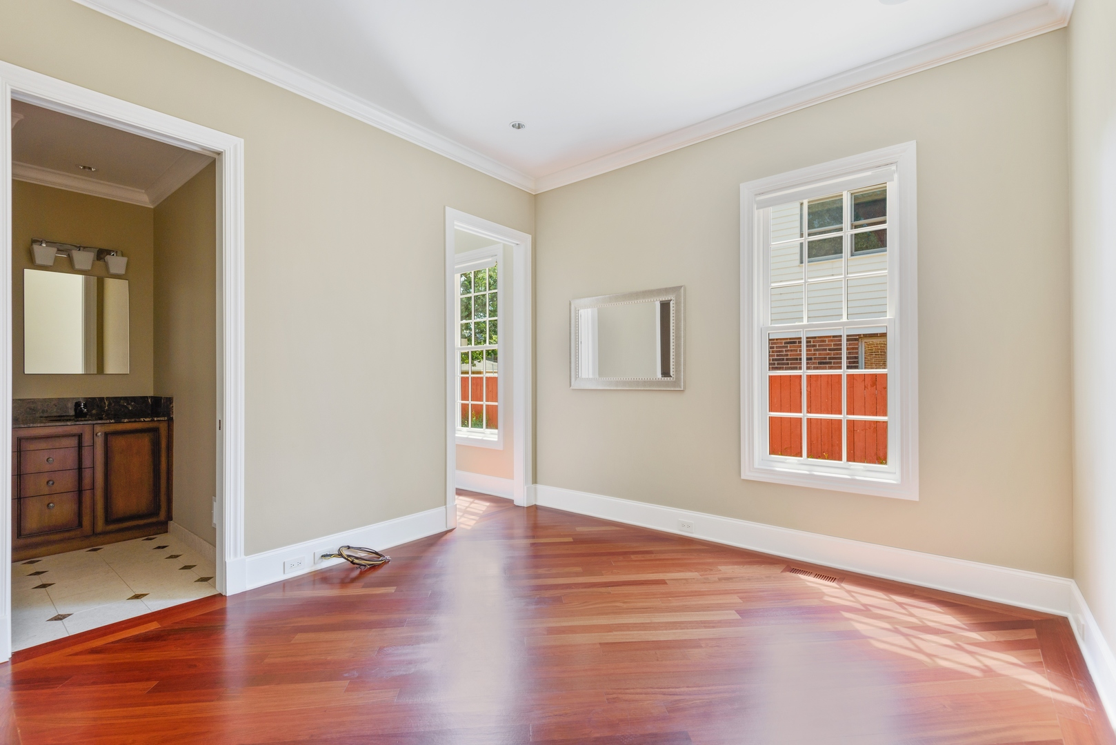 2015 Lake Avenue Wilmette, IL 60091 - Photo 25 of 45 an empty room with wooden floor and windows