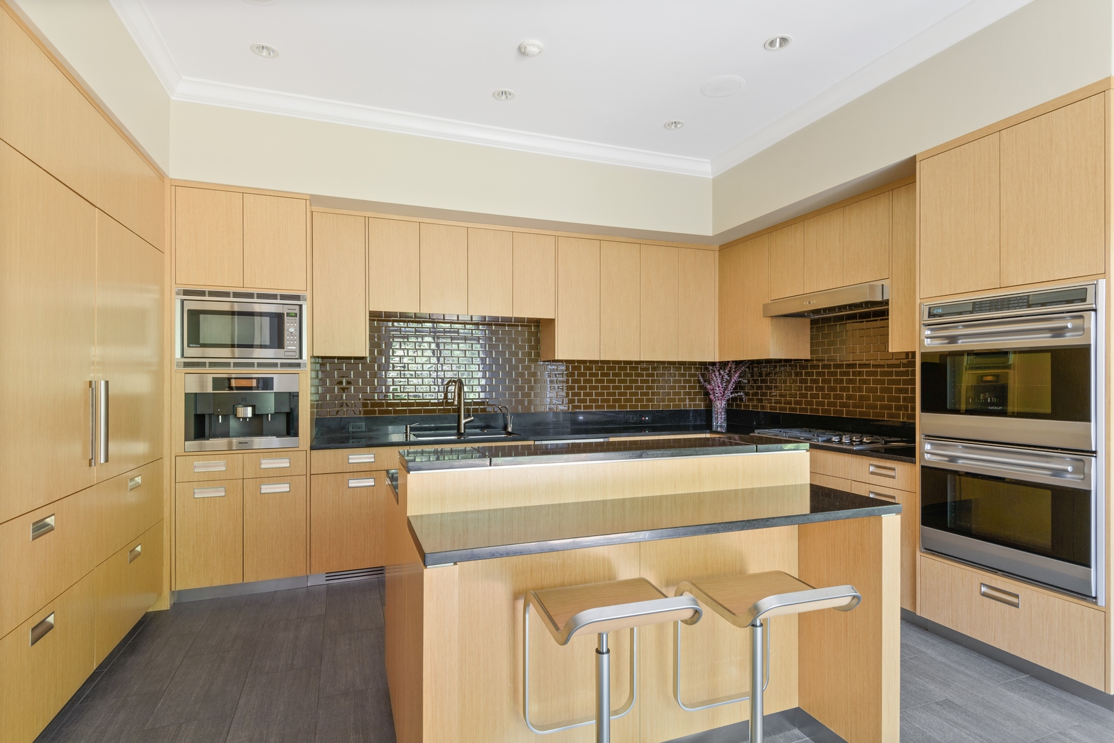 2015 Lake Avenue Wilmette, IL 60091 - Photo 7 of 45 a kitchen with stainless steel appliances granite countertop a stove and a refrigerator