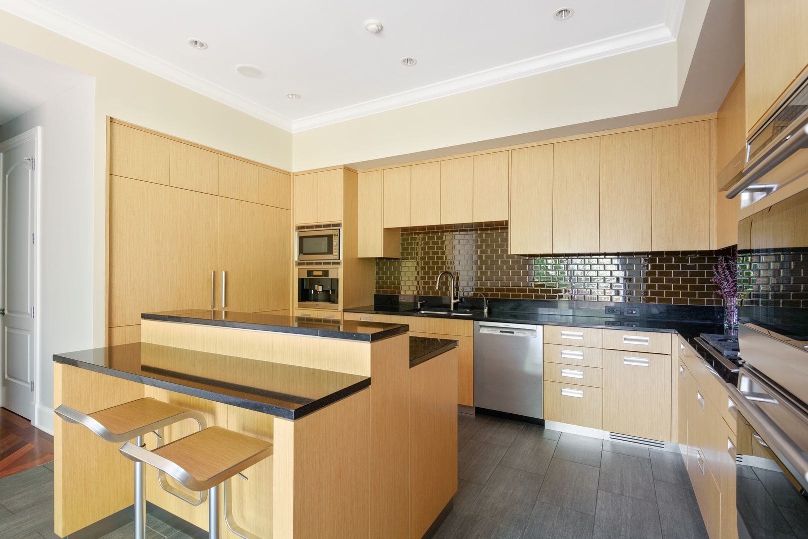 2015 Lake Avenue Wilmette, IL 60091 - Photo 8 of 45 a kitchen with stainless steel appliances granite countertop a sink and a stove