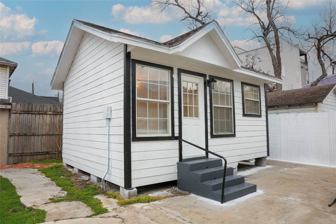 10 Jenkins Street Houston, TX 77003 - Photo 1 of 22 a view of a house with backyard and wooden fence