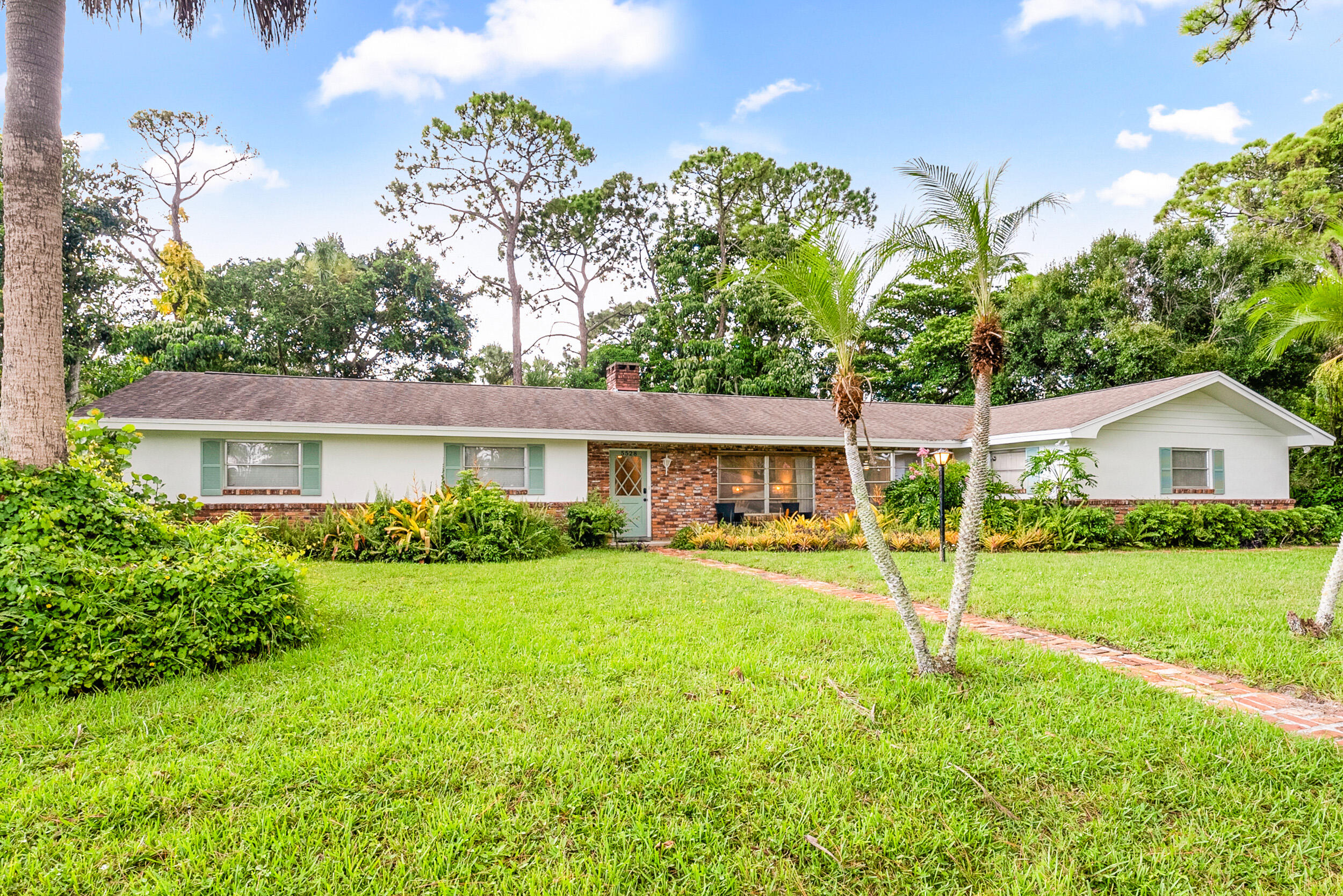 5528 Hibiscus Road Jupiter, FL 33458 - Photo 1 of 19 5528 Hibiscus