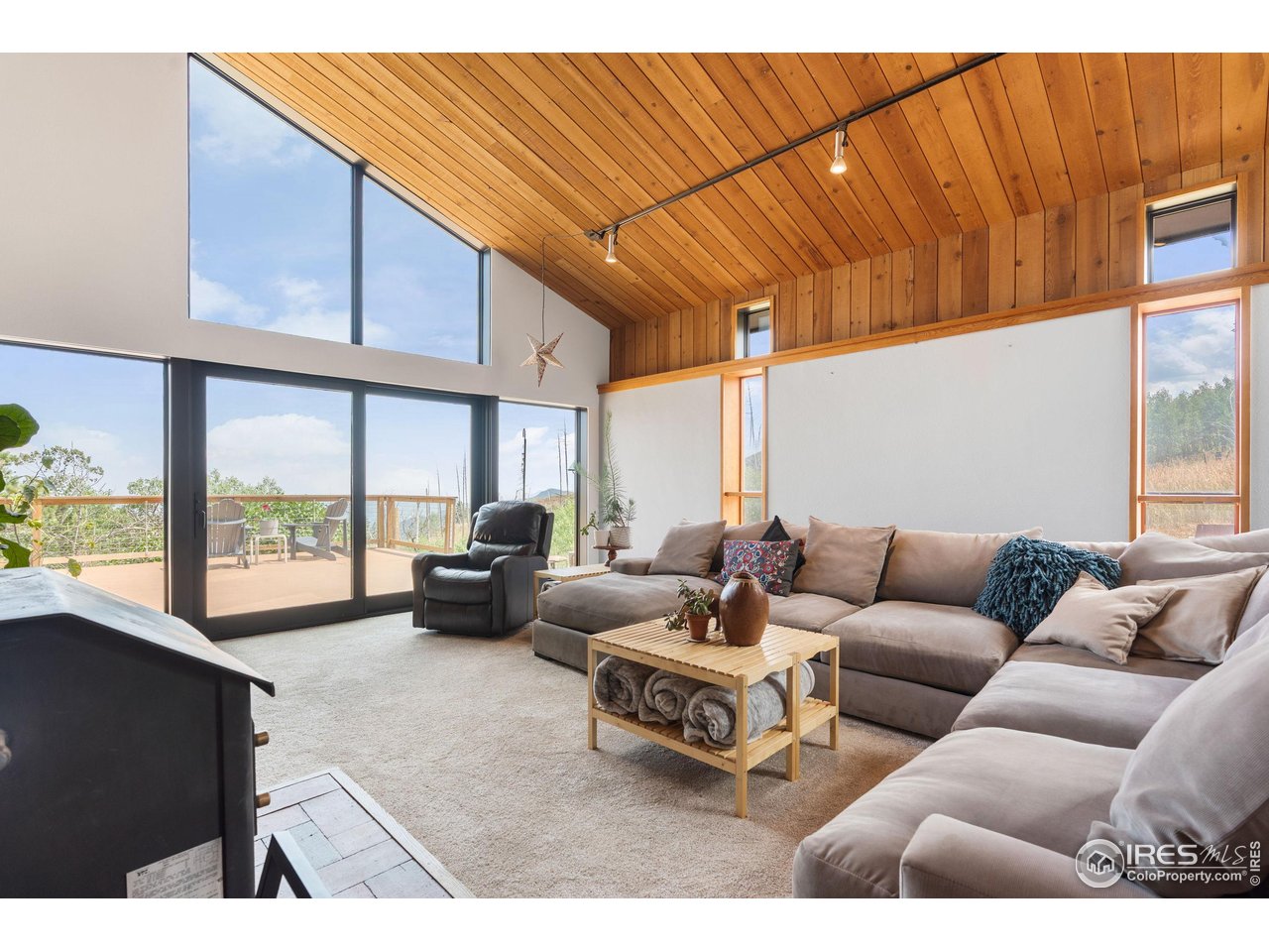 89 Gold Trail Boulder, CO 80302 - Photo 2 of 48 a living room with furniture and a large window