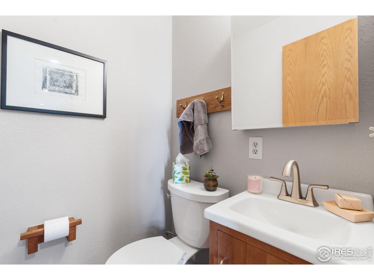 89 Gold Trail Boulder, CO 80302 - Photo 26 of 48 a bathroom with a sink a toilet and mirror