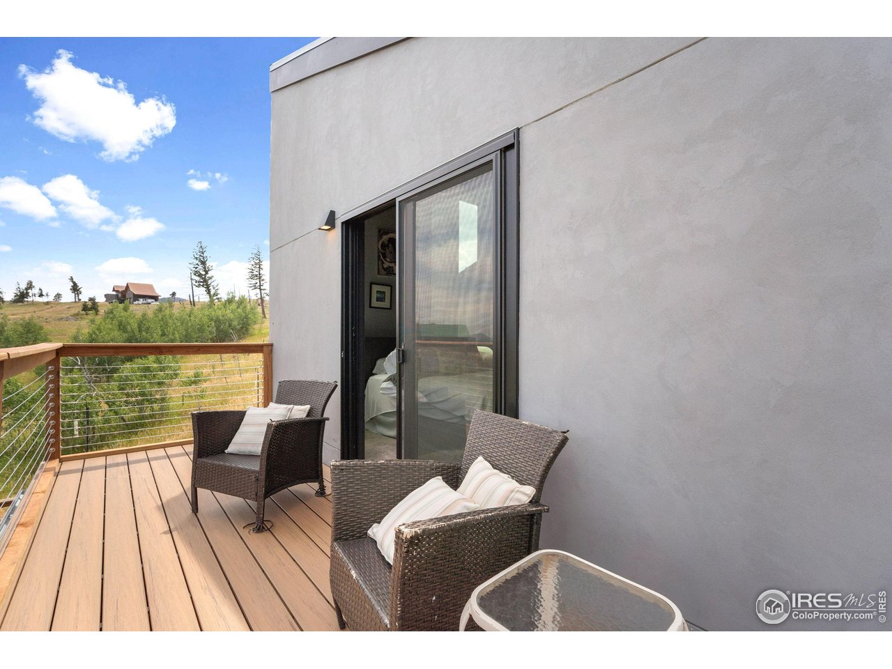 89 Gold Trail Boulder, CO 80302 - Photo 30 of 48 a balcony view with couple of chairs