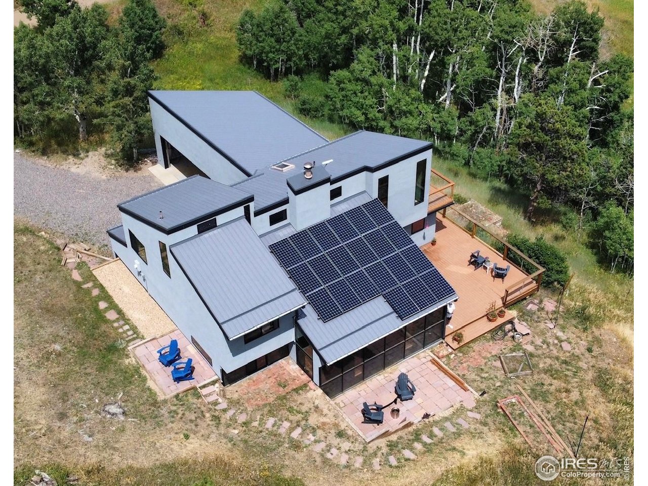 89 Gold Trail Boulder, CO 80302 - Photo 41 of 48 an aerial view of a house with a yard and trees