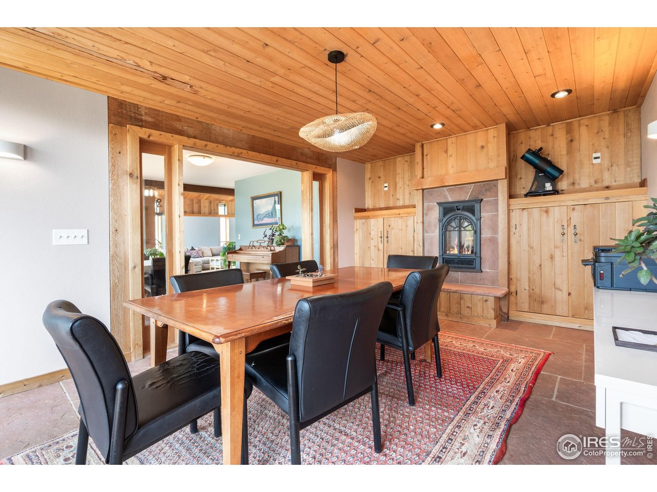 89 Gold Trail Boulder, CO 80302 - Photo 10 of 48 a dining room with furniture and a large window