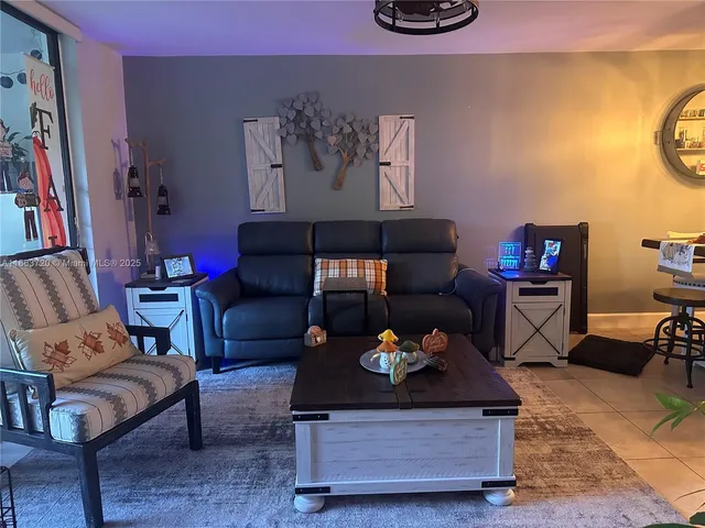 a living room with furniture and a couch