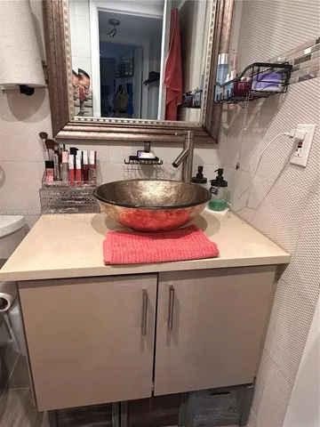 a kitchen with a stove and a sink