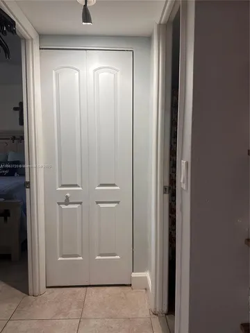 a view of elevator with hallway