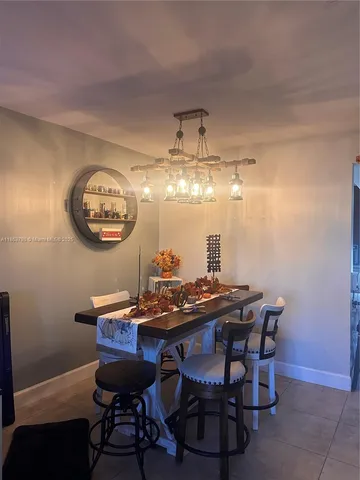 a table and chairs in a room