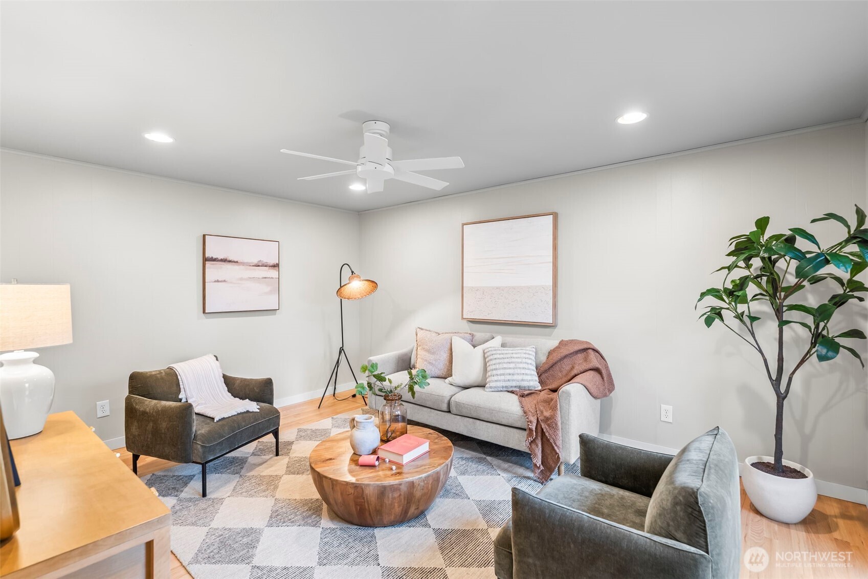 16519 116th Place Southeast Renton, WA 98058 - Photo 16 of 28 a living room with furniture and a potted plant