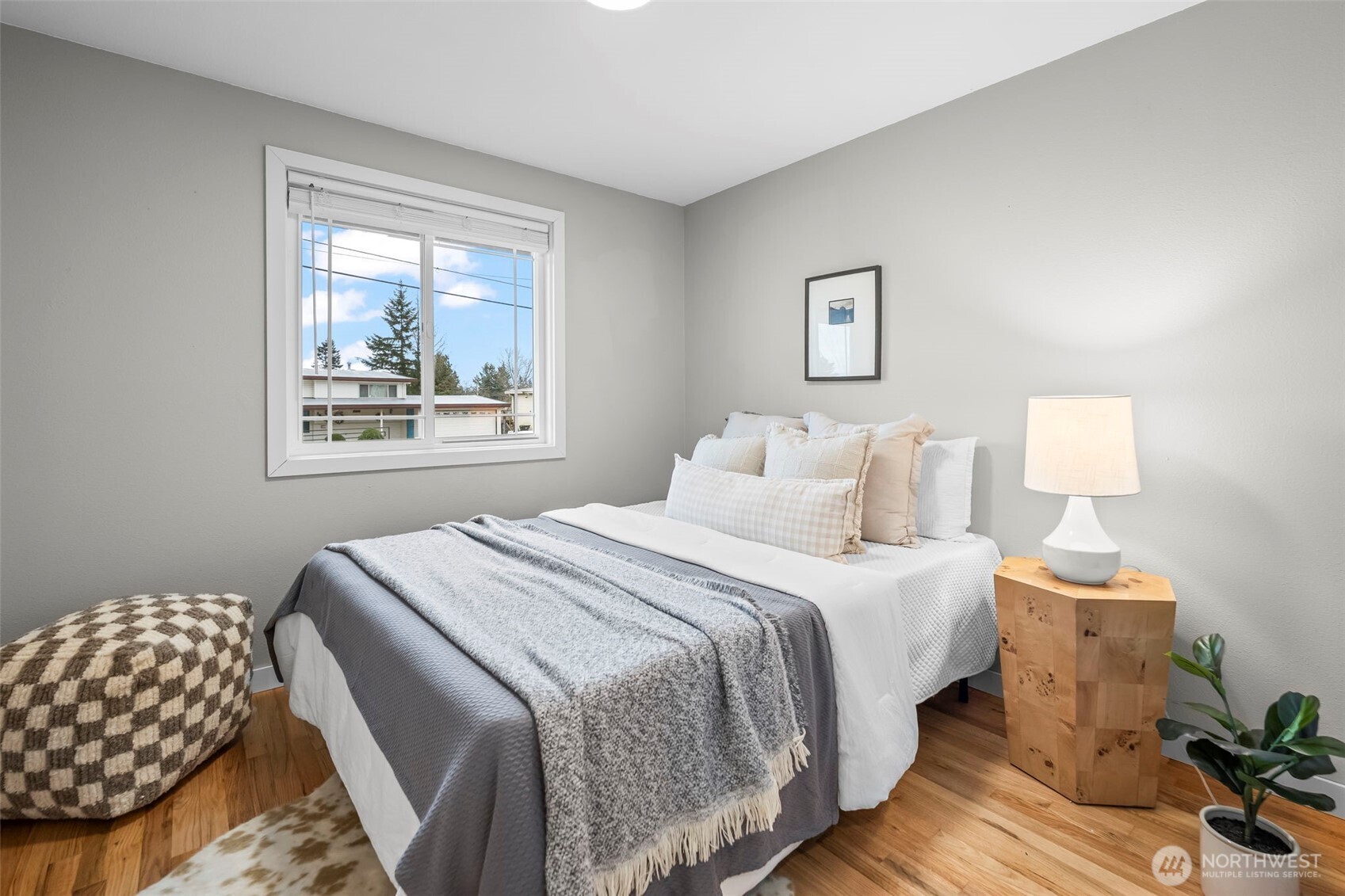 16519 116th Place Southeast Renton, WA 98058 - Photo 20 of 28 a bedroom with bed and a night stand