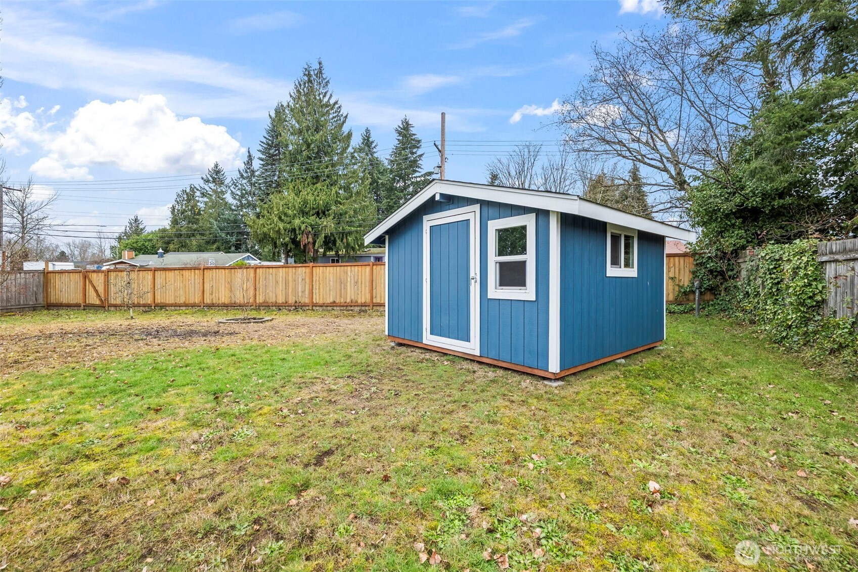 16519 116th Place Southeast Renton, WA 98058 - Photo 27 of 28 a view of a house with wooden fence