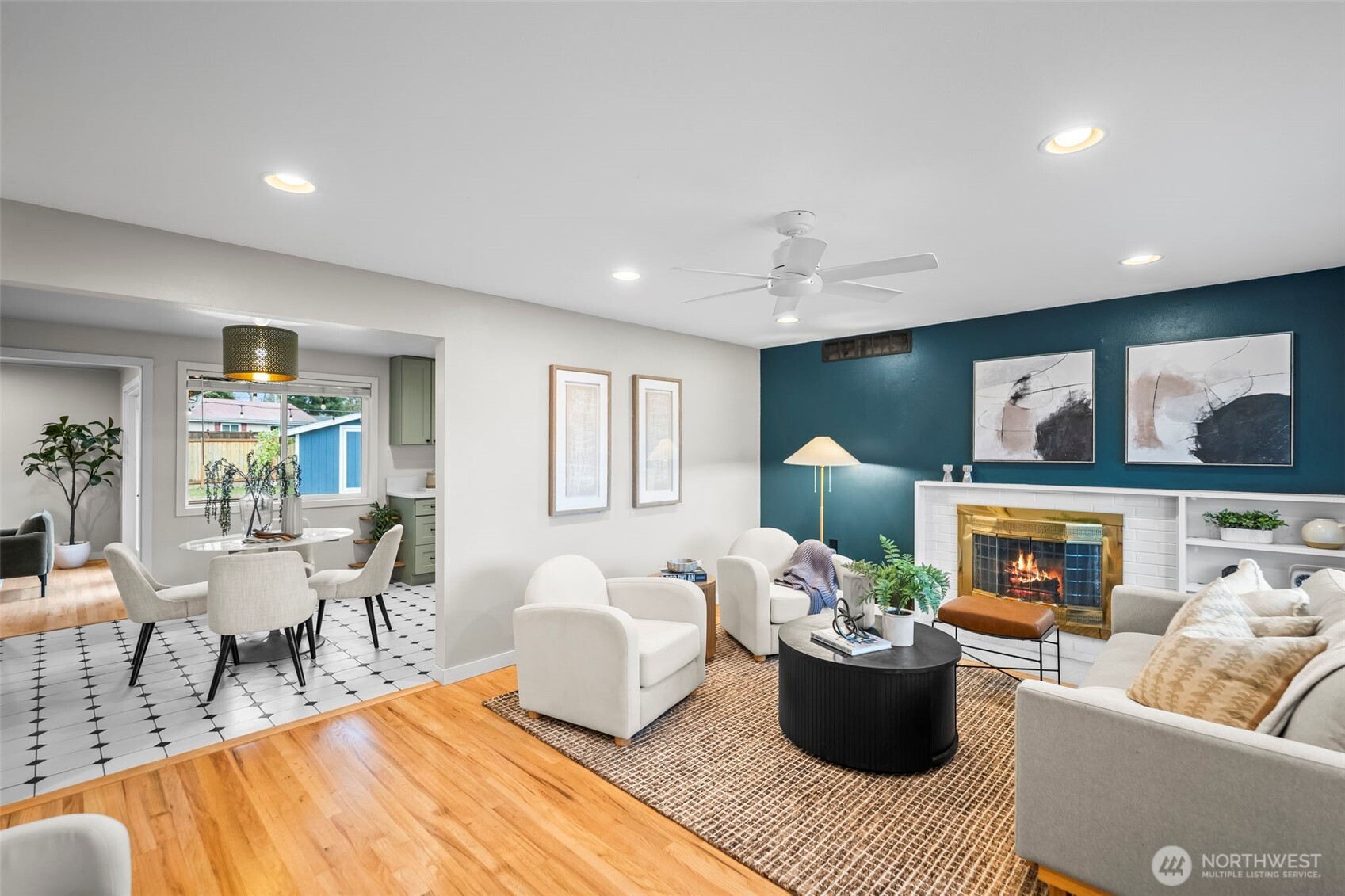 16519 116th Place Southeast Renton, WA 98058 - Photo 6 of 28 a living room with furniture and painting on the wall