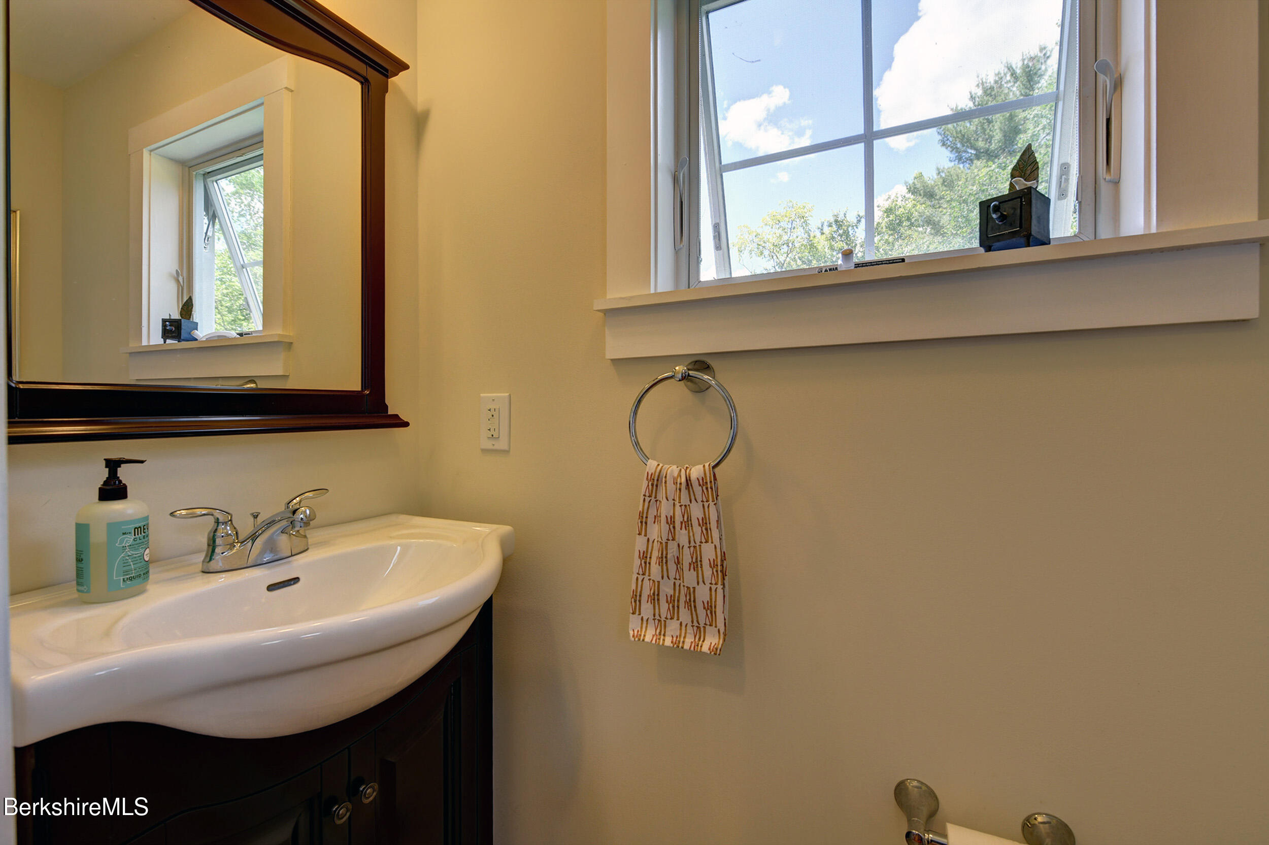 66 Access Road Becket, MA 01223 - Photo 30 of 54 a bathroom with a sink and a mirror
