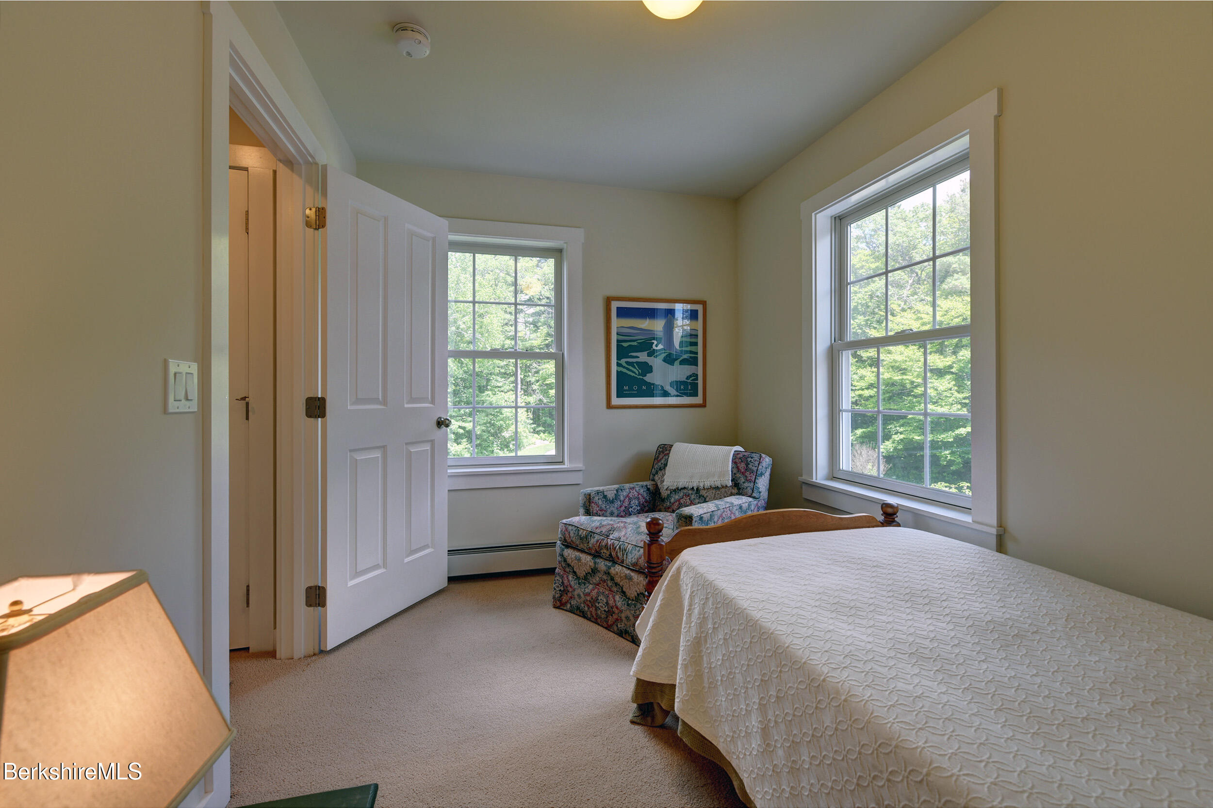 66 Access Road Becket, MA 01223 - Photo 37 of 54 a bed room with a bed and a window