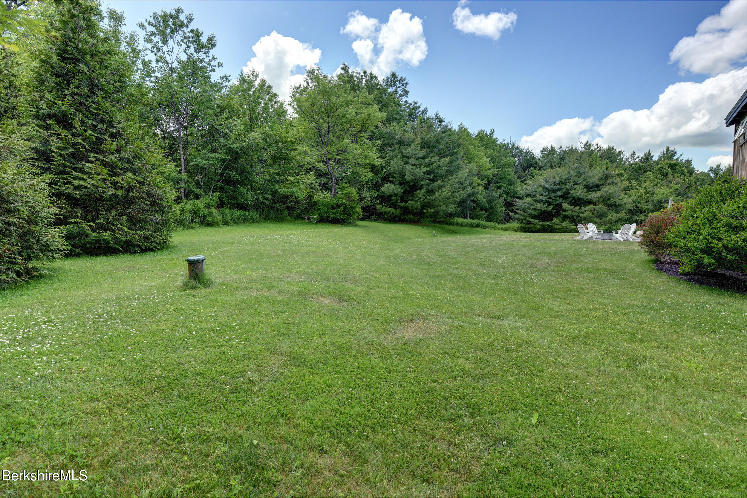 66 Access Road Becket, MA 01223 - Photo 47 of 54 a front view of a house with a yard