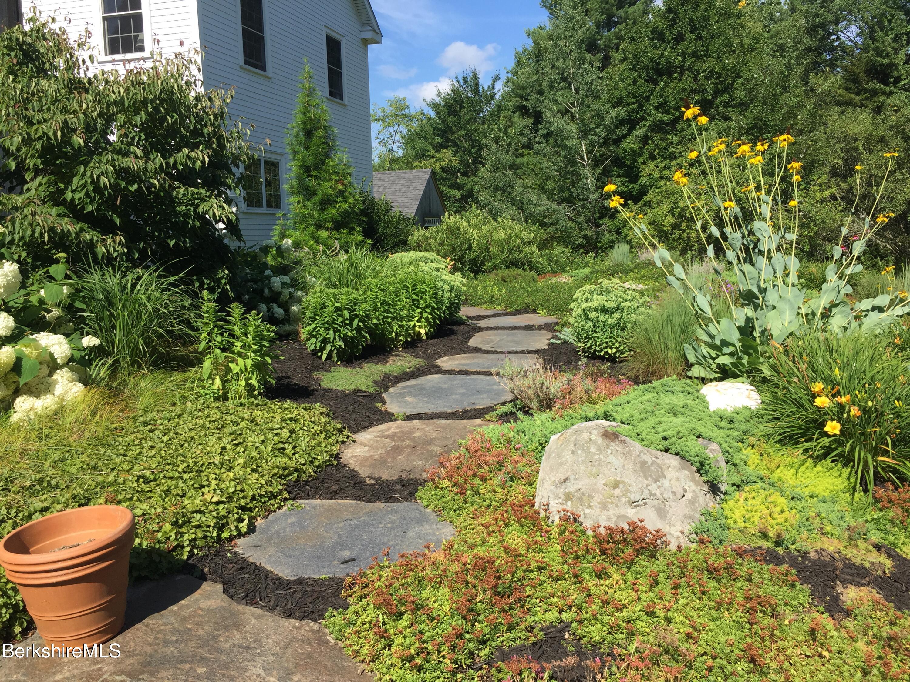66 Access Road Becket, MA 01223 - Photo 49 of 54 a view of a backyard of the house