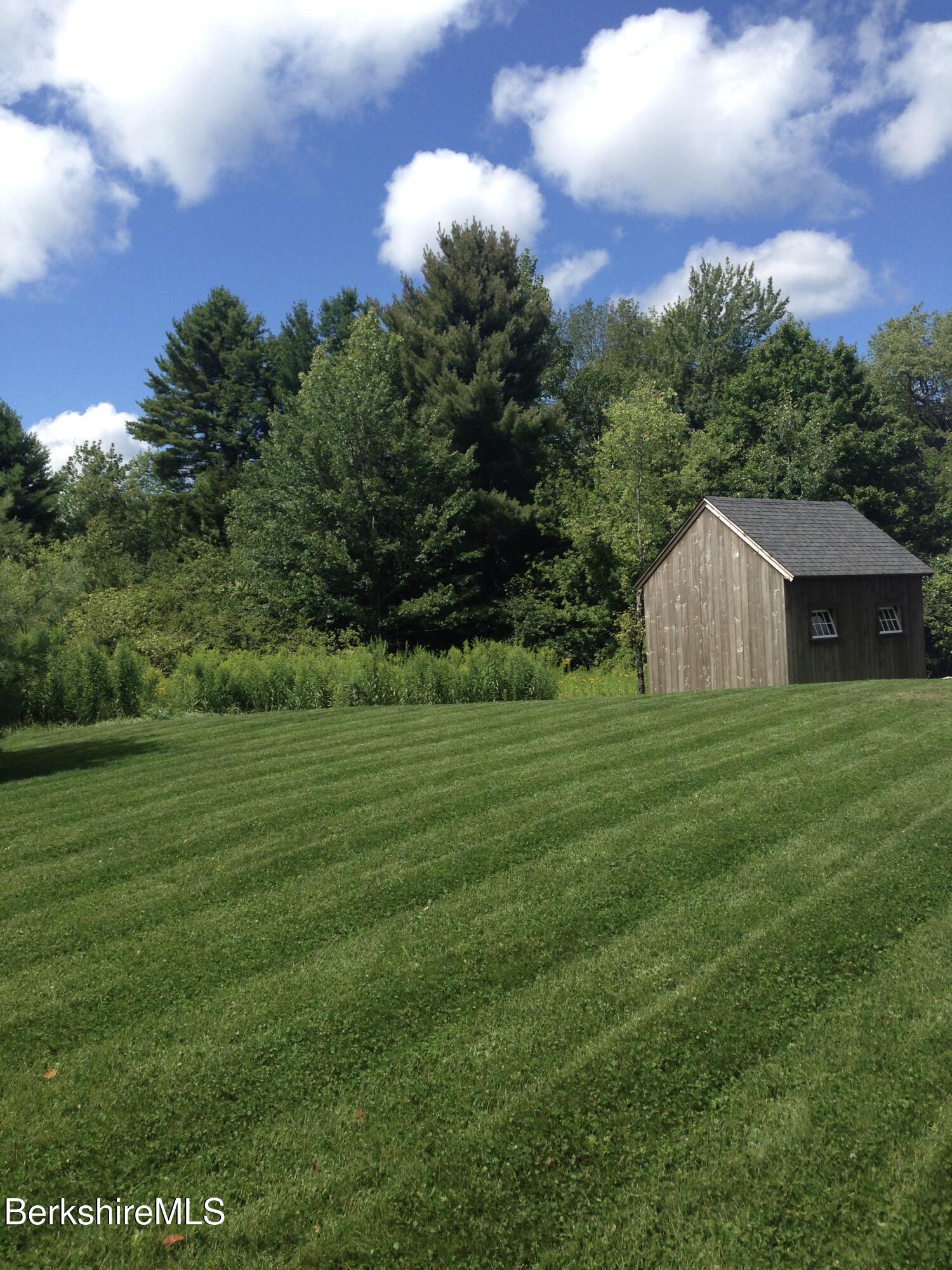 66 Access Road Becket, MA 01223 - Photo 52 of 54 a house view with a garden space