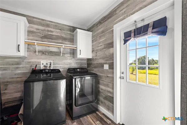 a kitchen with a stove and a sink