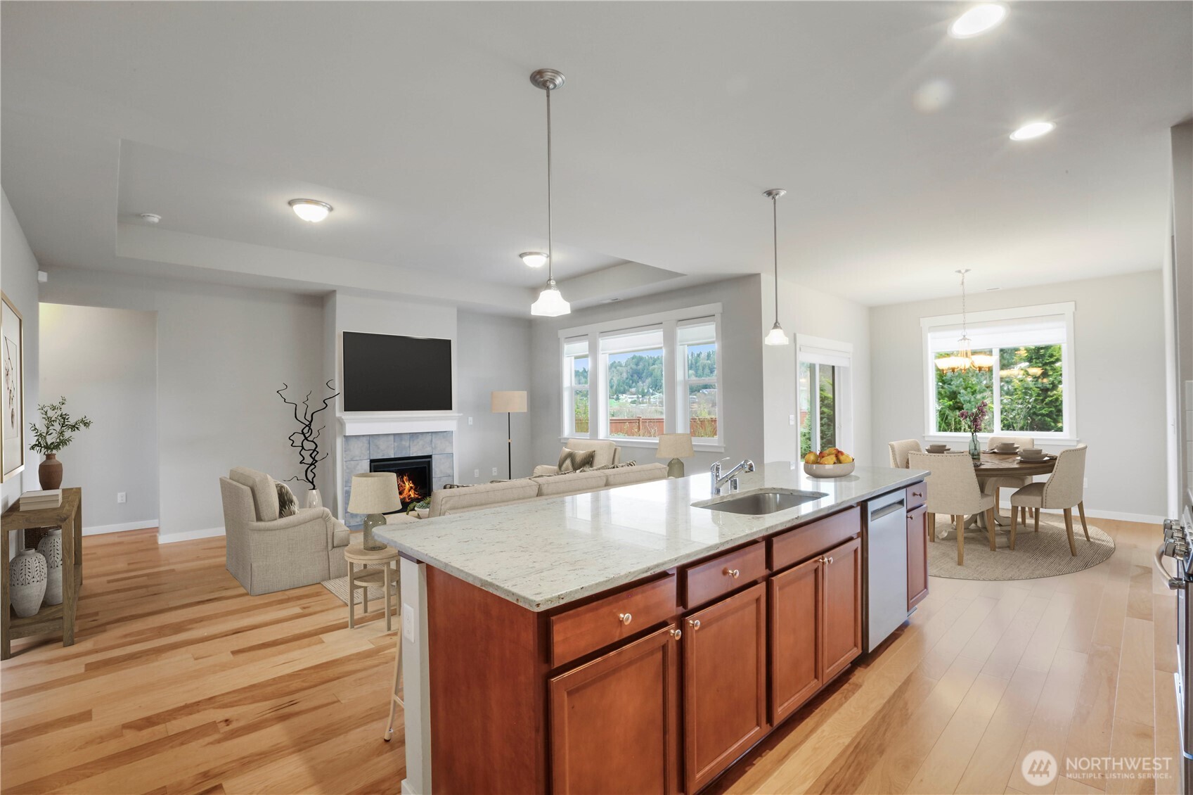 4192 McLaughlin Road Mount Vernon, WA 98273 - Photo 17 of 40 a living room with furniture a flat screen tv and a chandelier