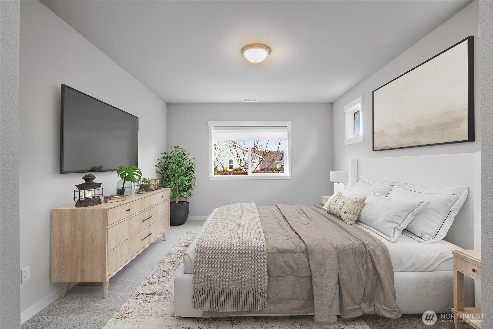 4192 McLaughlin Road Mount Vernon, WA 98273 - Photo 29 of 40 a bedroom with a large bed and a flat screen tv