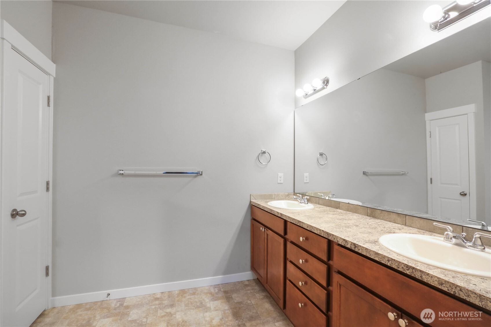 4192 McLaughlin Road Mount Vernon, WA 98273 - Photo 32 of 40 a bathroom with a granite countertop sink and a mirror
