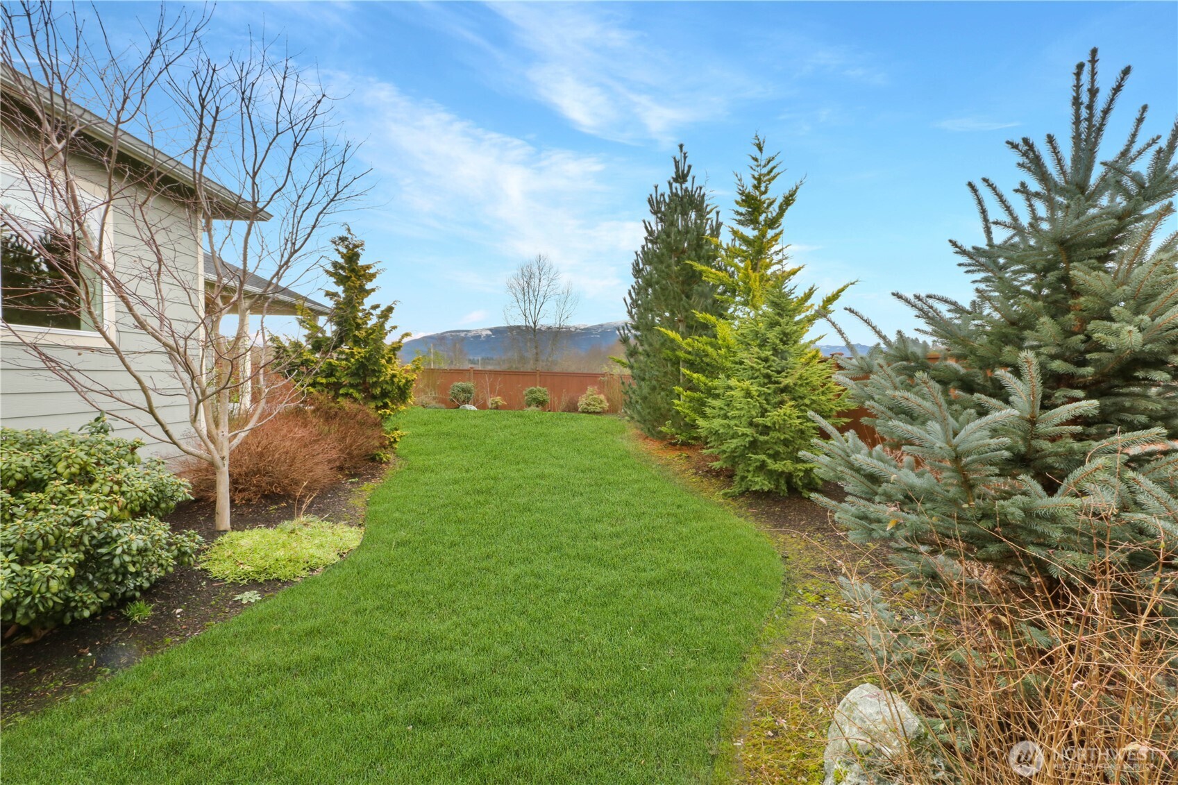 4192 McLaughlin Road Mount Vernon, WA 98273 - Photo 37 of 40 a view of a garden with a house