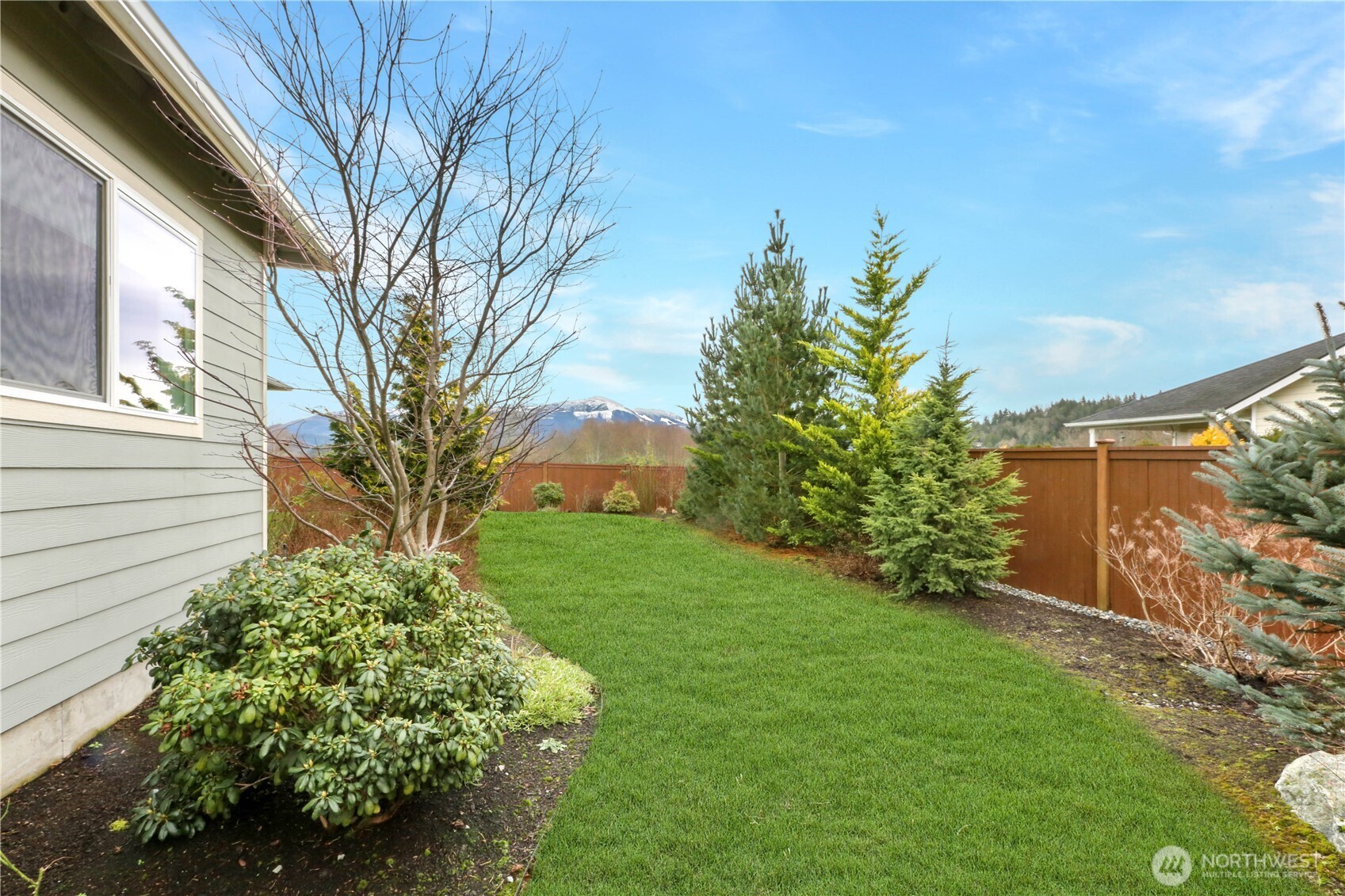 4192 McLaughlin Road Mount Vernon, WA 98273 - Photo 38 of 40 a view of a garden with a house