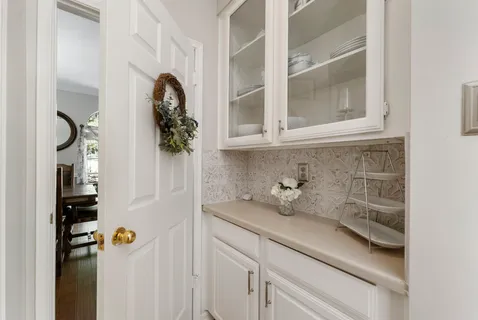 a bathroom with a sink and mirror