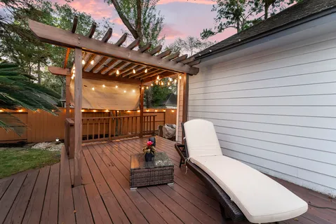 a view of roof deck with patio