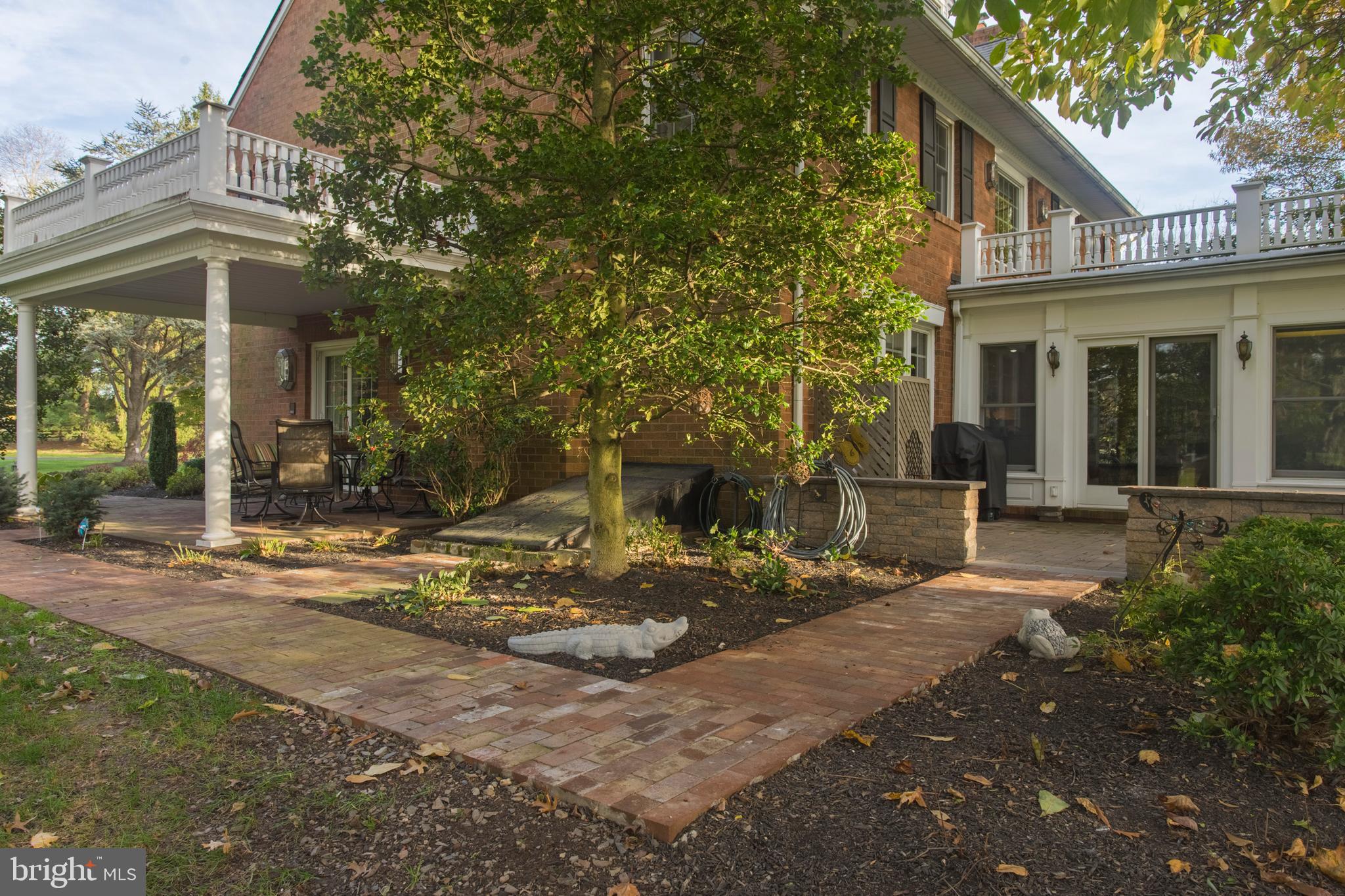 910 Morris Road Blue Bell, PA 19422 - Photo 47 of 56 Paver Walkway between Patios