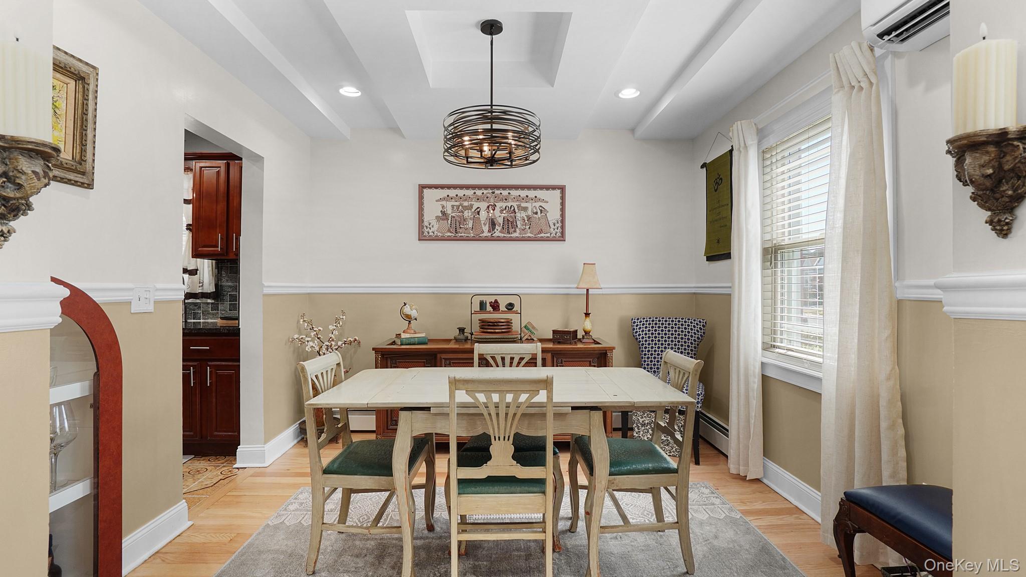 172-17 Amelia Road Queens, NY 11434 - Photo 5 of 18 a view of a dining room with furniture and wooden floor