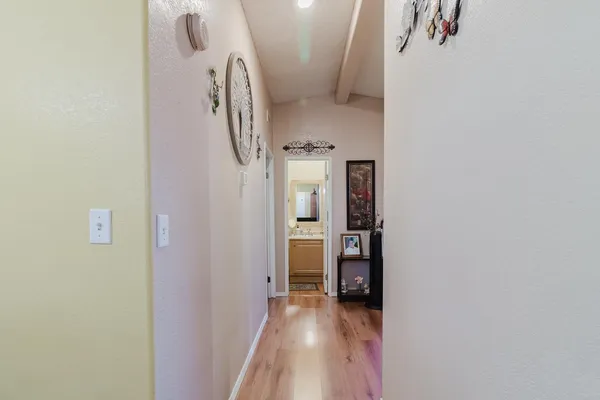 a bathroom with a sink toilet and a mirror