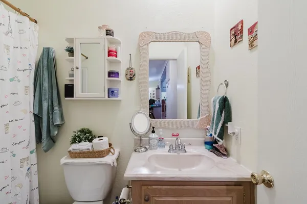 a bathroom with a shower and a tub