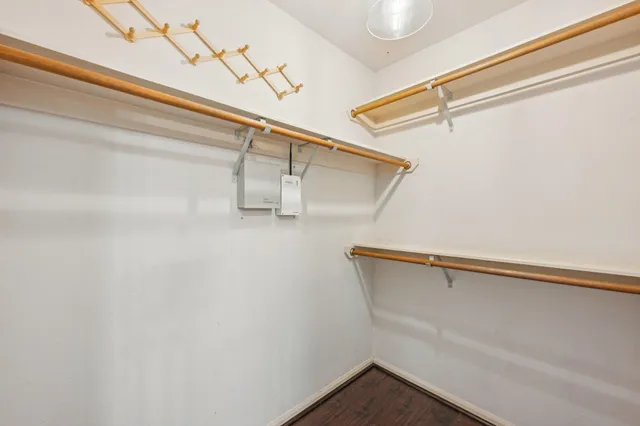 a view of a room with racks on the wall