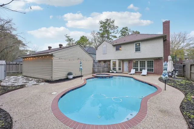 a view of outdoor space yard swimming pool and porch
