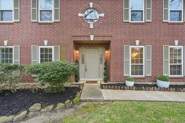 a front view of a house having yard
