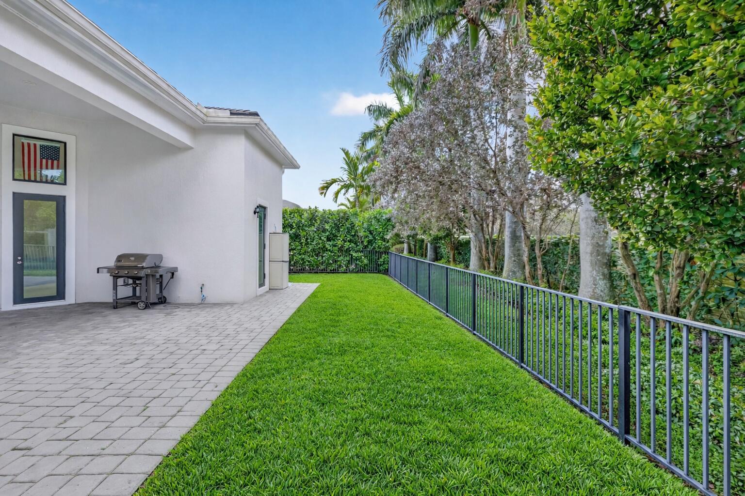 6980 Northwest 28th Avenue Boca Raton, FL 33496 - Photo 60 of 69 Backyard retreat with lush lawn