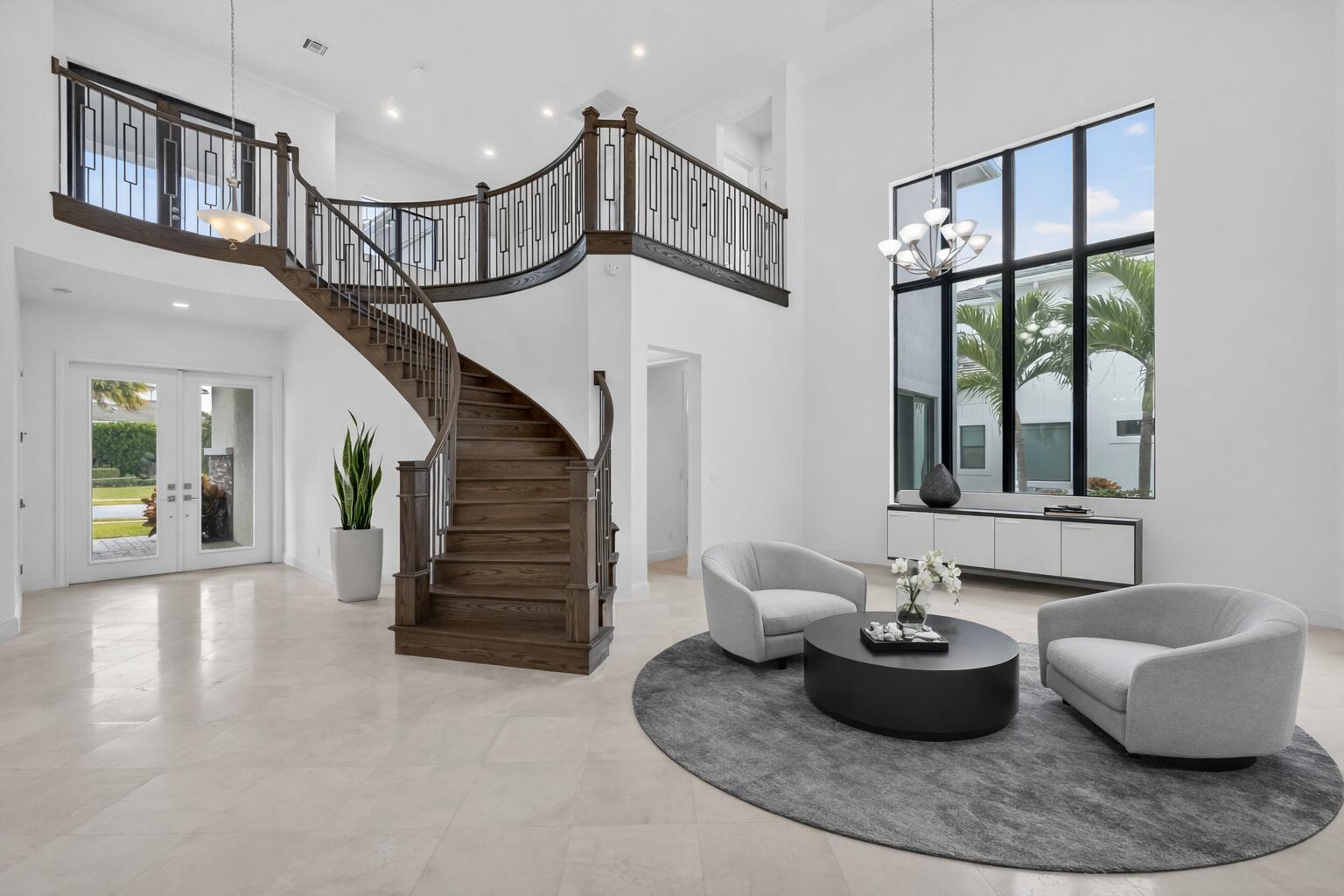 6980 Northwest 28th Avenue Boca Raton, FL 33496 - Photo 7 of 70 Modern foyer with curved staircase and s