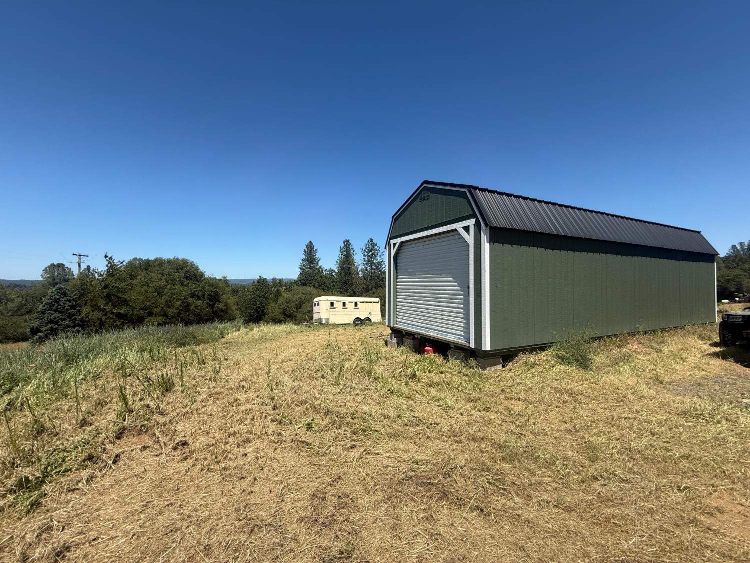 2322 Myrick Road Somerset, CA 95684 - Photo 16 of 30 a backyard of a house